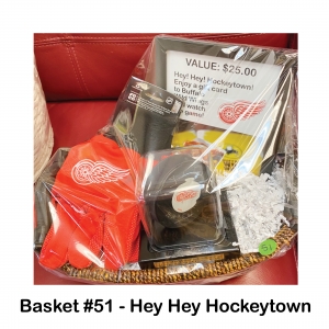 $25 Buffalo Wild Wings 
Gift Card,
Red Wings Gloves,
Signed Ted Lindsay Puck
