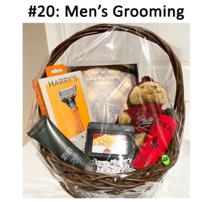 This basket includes a gift card, bear, wallet, and various mens care items.