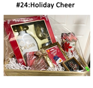 This basket includes a RumChata gift set, scarf, candle holder, pin, bracelet, napkins, and a gift card.