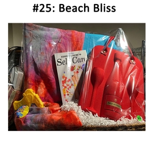This basket includes a chair, sun lounger cover, champagne set bag, book, and a squirt gun.