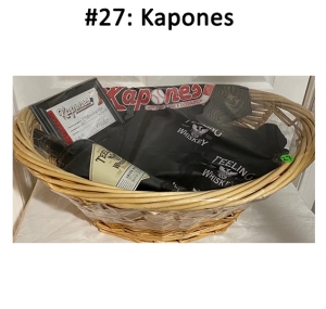 This basket includes T-shirts, gift certificate, whiskey, and almonds.