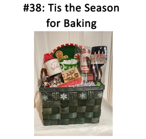 This basket includes a gift certificate, tablecloth, turner, ornament, mug, tea, cookbook, stencils, and cookie tray.