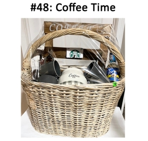 This basket includes a coffee rack, coffee scoop, vanilla syrup, mugs, and a gift card.