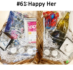 This basket includes a clear votive holder, flameless candles, wine glasses, gift card, scarf, earrings & bracelet set, journal, and chardonnay.
