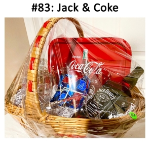 This basket includes Jack Daniel's, serving tray, decanter, glasses, and coasters.