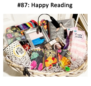 This basket includes a Vera Bradley purse & matching wallet, coffee mug, Happy Reading Amazon gift card, Book, Book Light, Head wrap, lotion and fuzzy socks.
